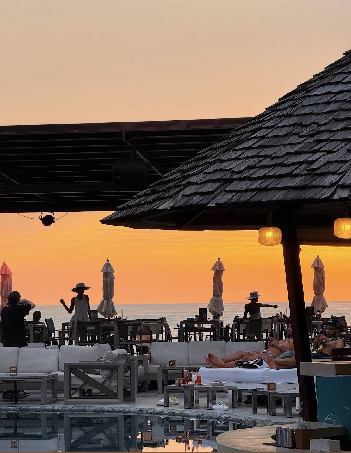 Kudo beach club poolside at sunset, Patong