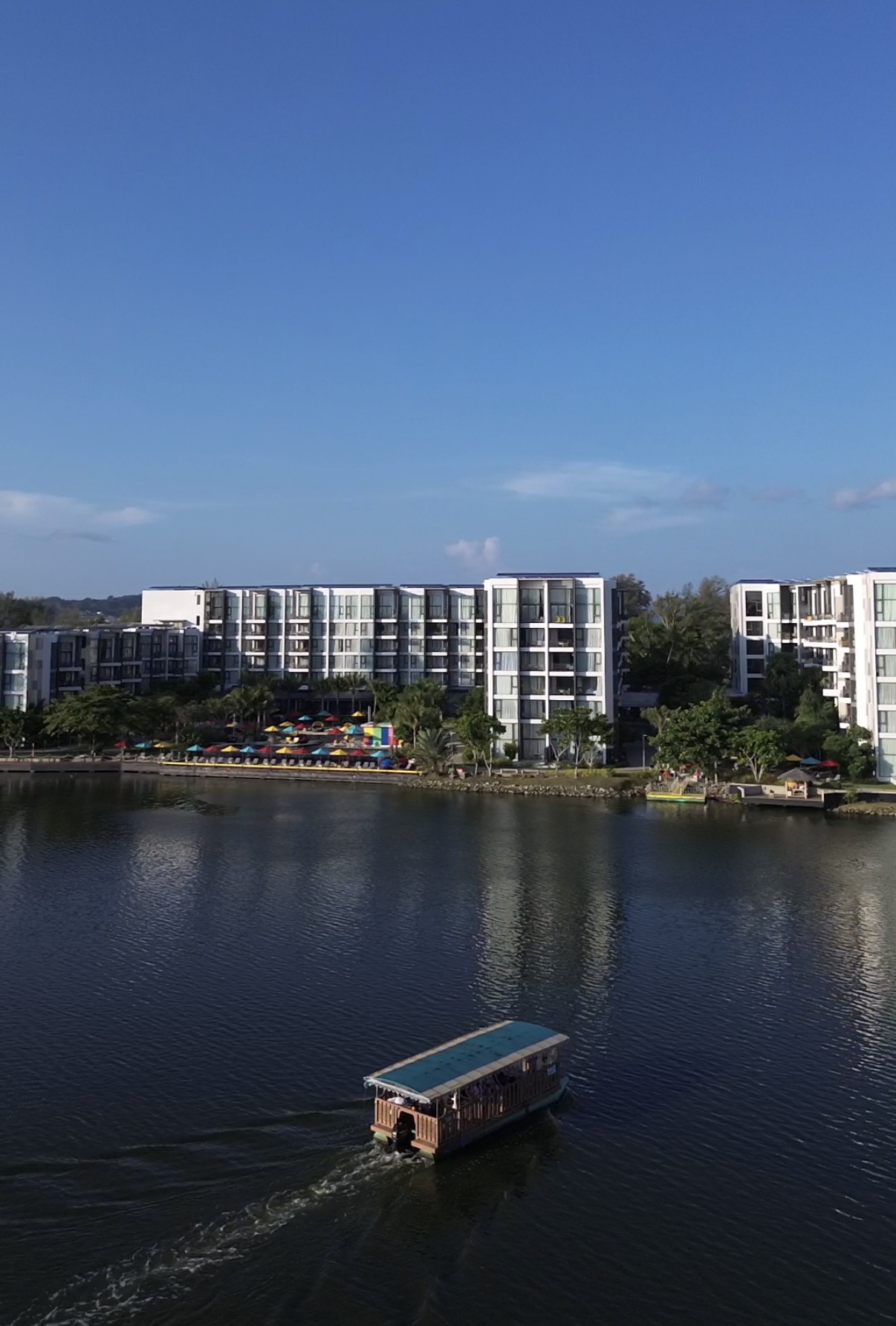 Cassia Phuket resort on the Laguna lagoon, with the hotel shuttle boat